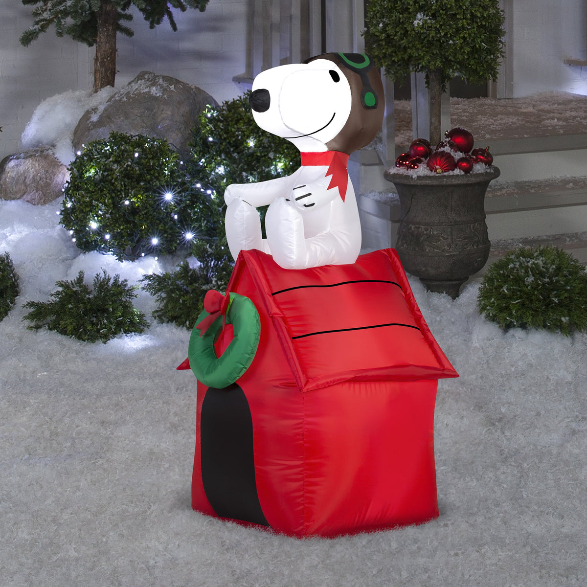 42" Airblown® Inflatable Peanuts® Christmas Snoopy Flying Ace on Doghouse Outdoor Yard Decoration
