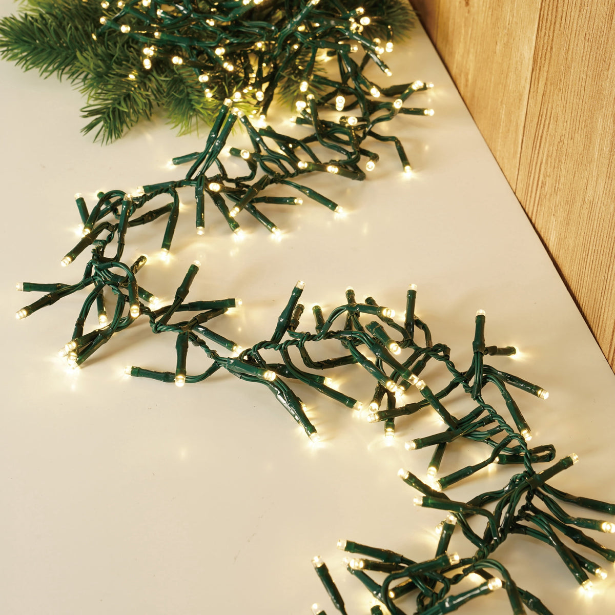 Indoor/Outdoor 400-Count LED Random Twinkle Cluster Christmas Garland Lights, Warm White, Green Wire, 9.8', by Holiday Time