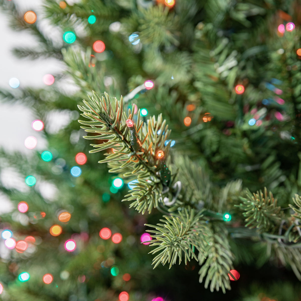 My Texas House 9' Pre-Lit Grand Spruce Green Artificial Christmas Tree with LumaDazzle Color-Changing Twinkle LED Lights, Quick Set, and Stand